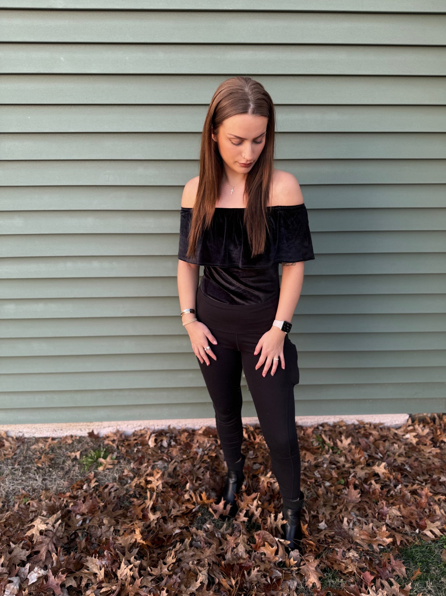 Black "off the shoulder" bodysuit